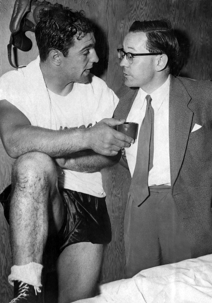 Detail of Boxer Rocky Marciano with journalist and commentator Harry Carpenter by Associated Newspapers