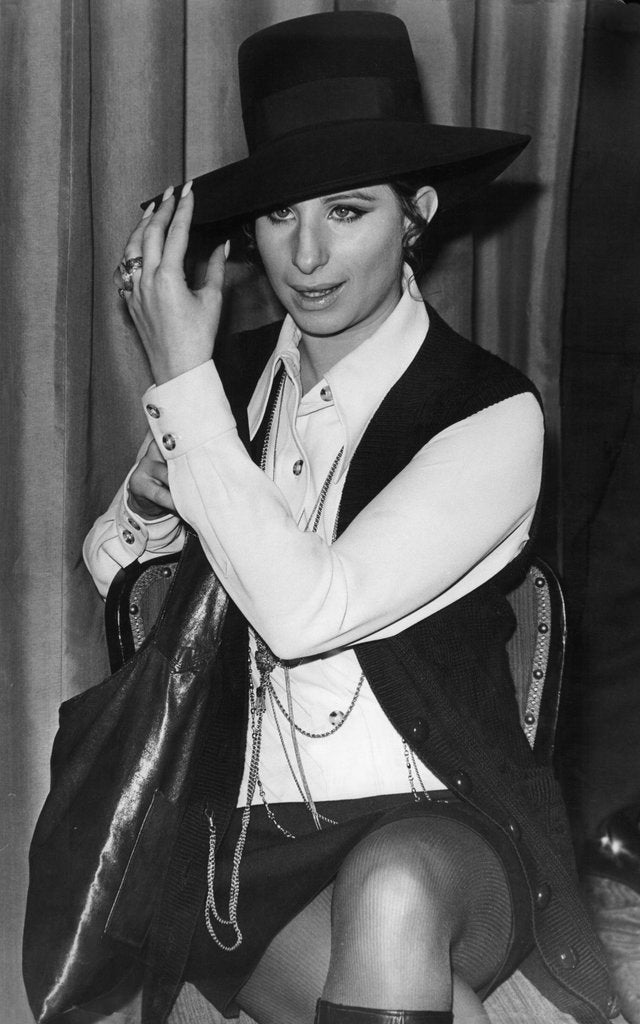 Detail of Barbra Streisand in a hat by Associated Newspapers