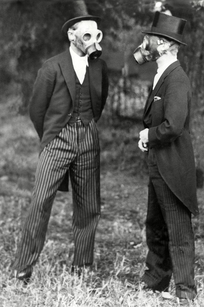 Detail of School boys trying out gas masks by Associated Newspapers