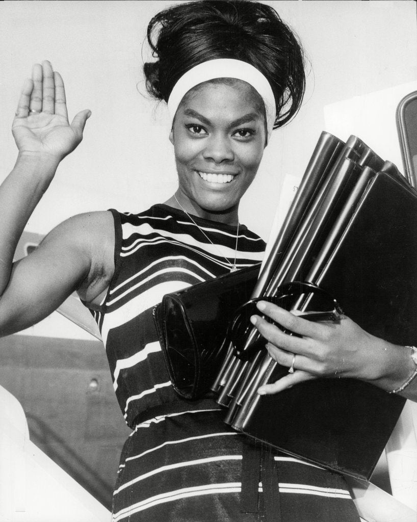 Detail of Dionne Warwick waves by Associated Newspapers