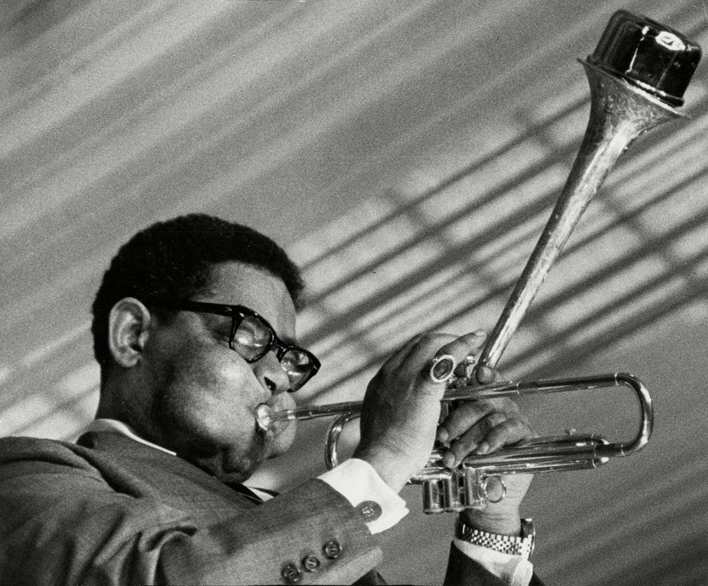 Detail of Dizzy Gillespie blows his horn by Associated Newspapers