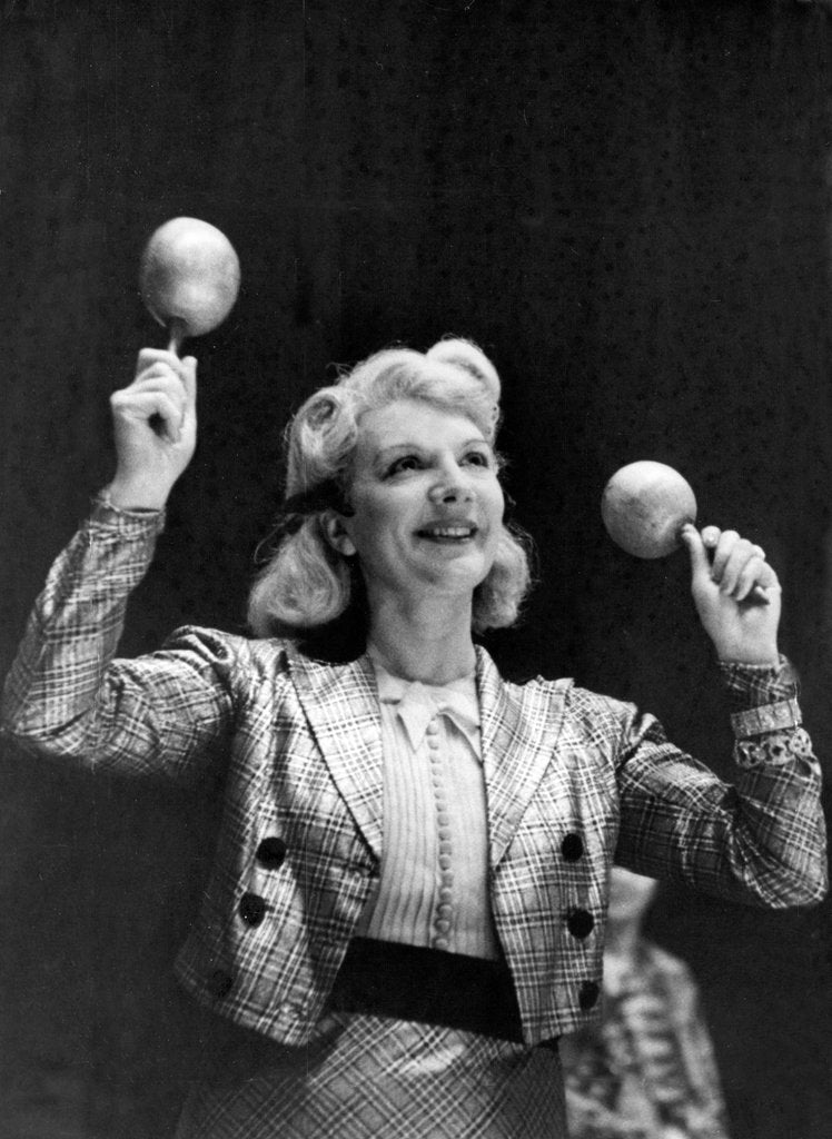 Detail of Dance band leader with maracas by Associated Newspapers