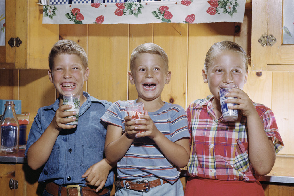 Detail of Happy Children Enjoying Glass of Cold Milk by Anonymous