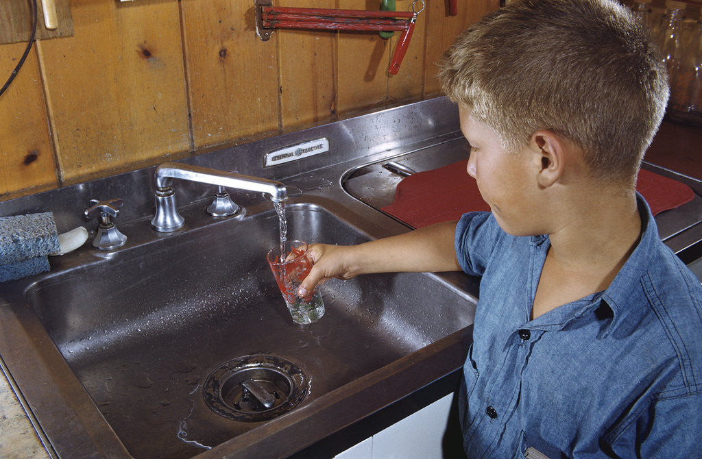 Detail of Boy Getting Glass of Tap Water by Anonymous