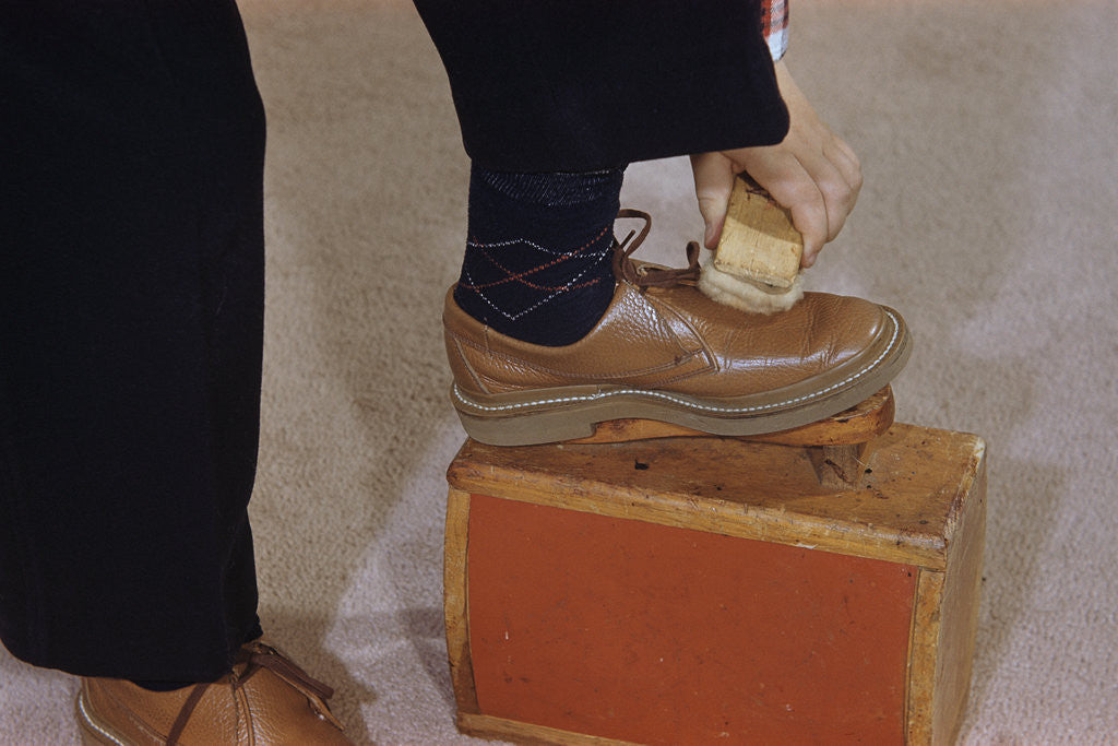 Detail of Man Buffing His Shoes by Anonymous
