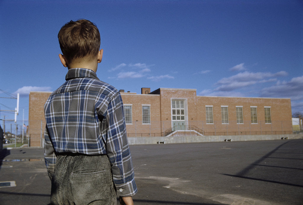 Detail of Boy Standing in Schoolyard by Anonymous