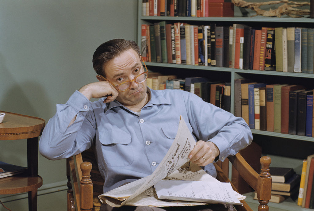 Detail of Man Holding Newspaper While Thinking by Anonymous