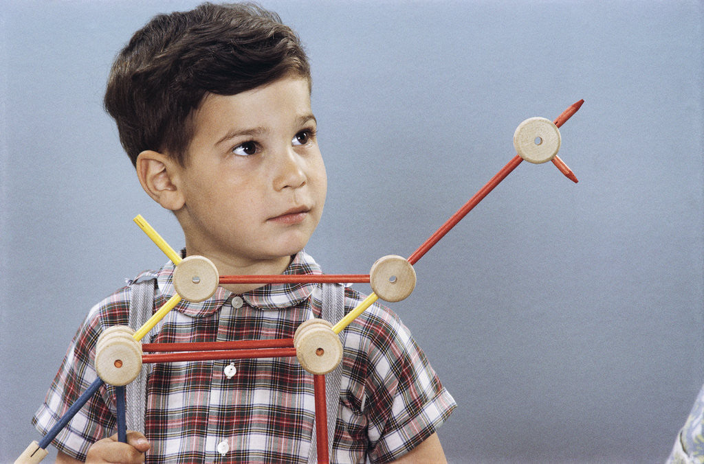 Detail of Boy Playing with Tinkertoys (TM) by Corbis