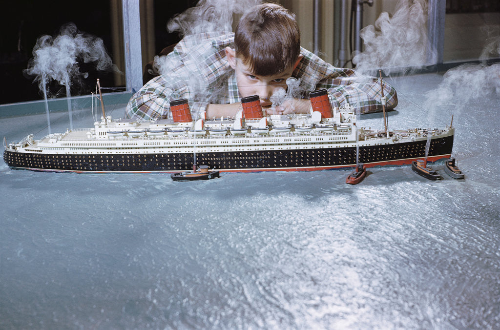 Detail of Boy Playing with Toy Ocean Liner by Anonymous