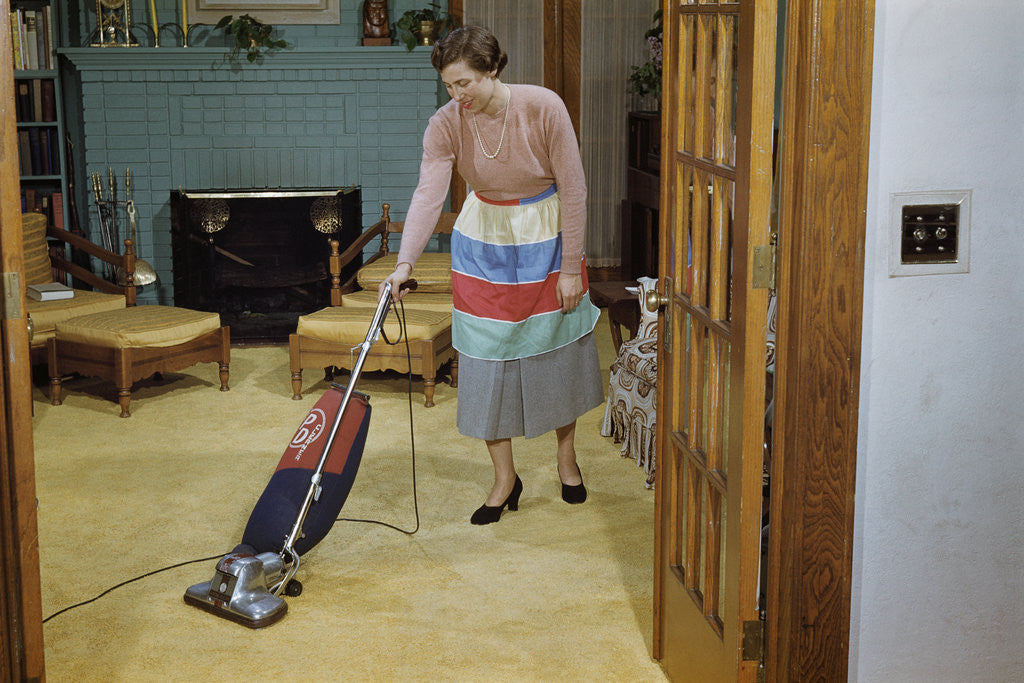 Detail of Woman Vacuuming Living Room by Anonymous