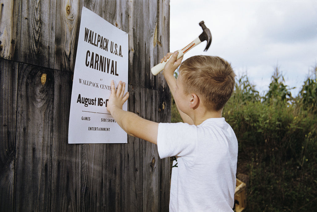 Detail of Boy Hammering Fair Sign by Anonymous
