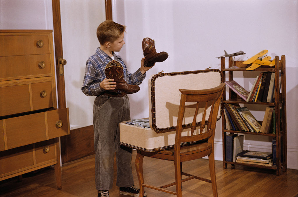 Detail of Boy Looking at Cowboy Boots by Anonymous