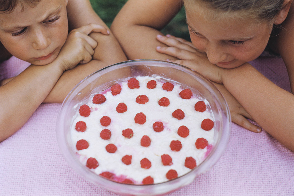 Detail of Children Eying Raspberry Dessert by Anonymous