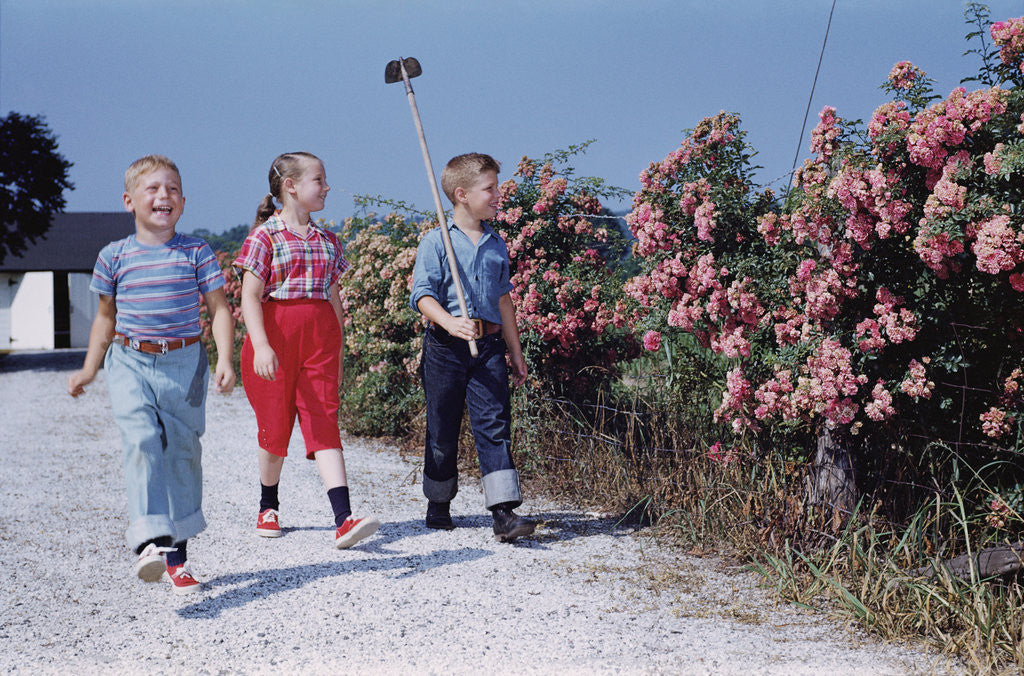 Detail of Children Walking Along Gravel Road by Anonymous