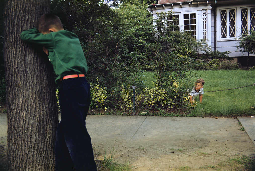Detail of Boys Playing Hide and Seek by Corbis