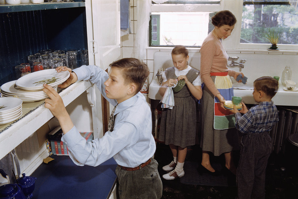 Detail of Family Cleaning the Dishes by Corbis