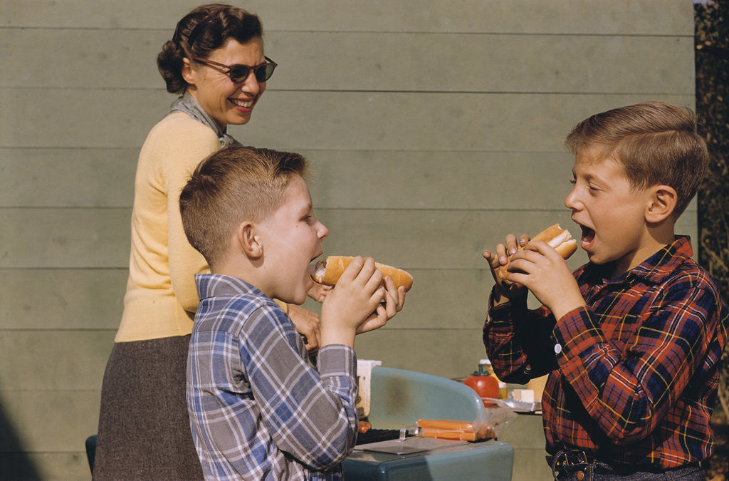 Detail of Boys Eating Hot Dogs by Corbis