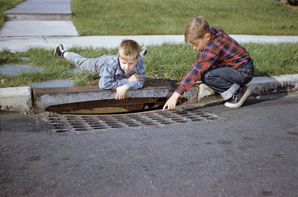 Detail of Boys Looking into Grate by Anonymous