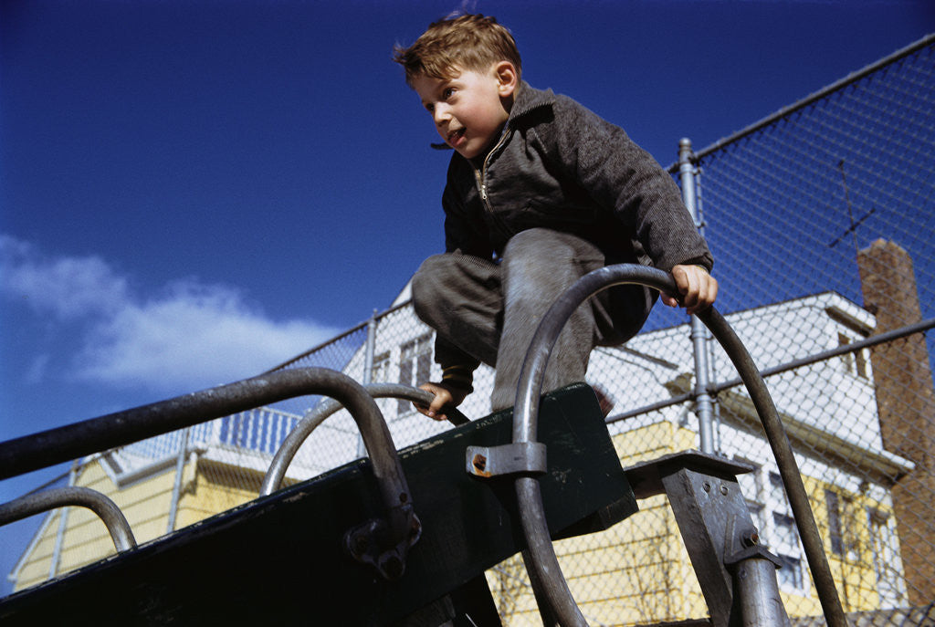 Detail of Boy Playing on Playground Slide by Anonymous