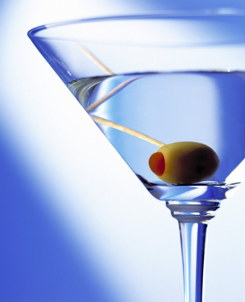 Detail of Green Olive in Martini Drink by Corbis
