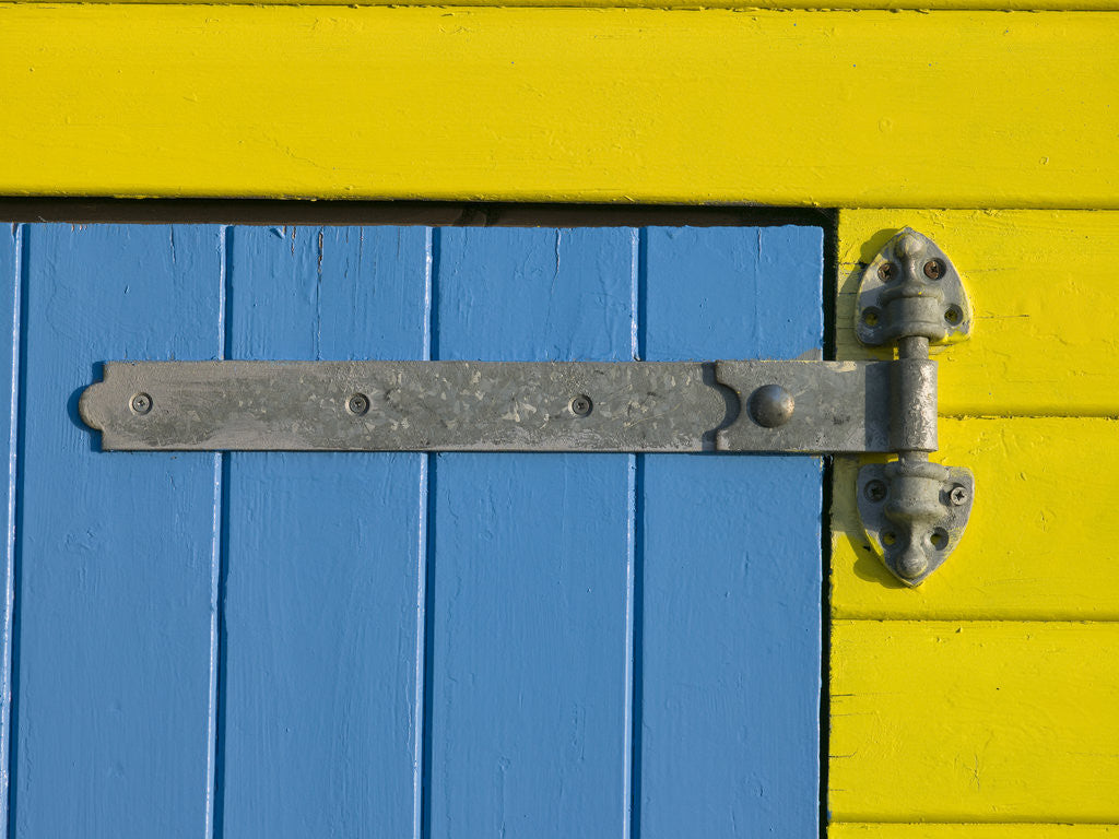 Detail of 32 Number Sign on Beach hut close-up, Blue Background by Assaf Frank