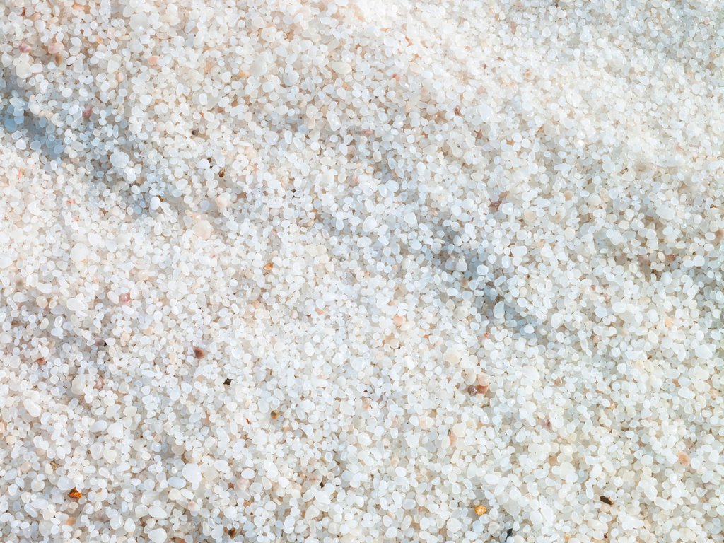 Detail of Salt granules at dead seashore by Assaf Frank