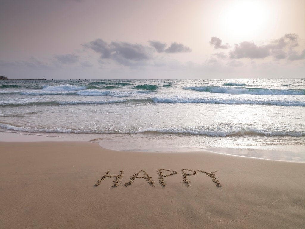 Detail of Sand writing on beach by Assaf Frank