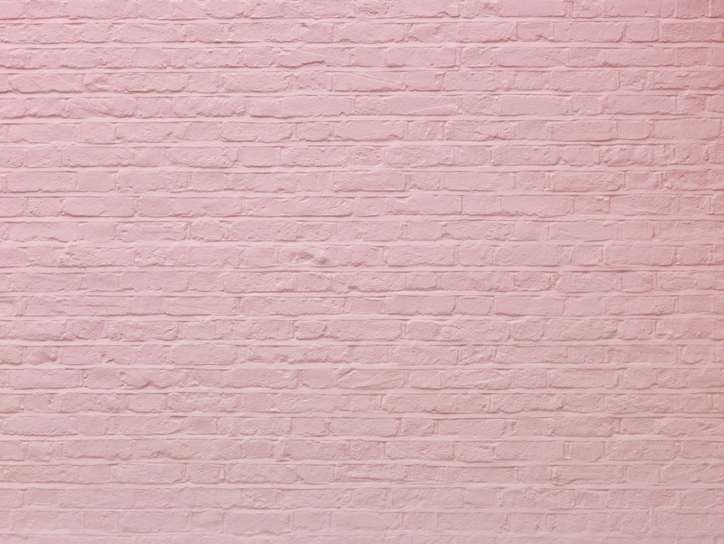 Detail of Pink color brick wall by Assaf Frank