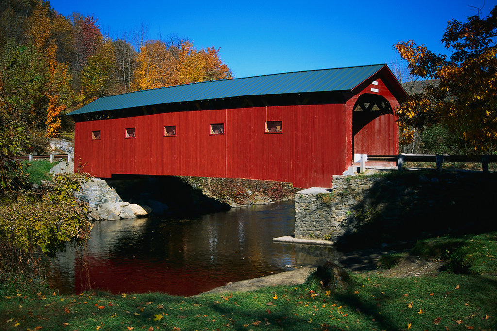 Detail of Red Covered Bridge on Rural Road by Corbis