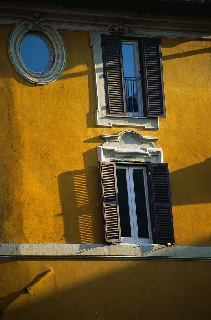 Detail of Shuttered Windows on Yellow Building by Anonymous