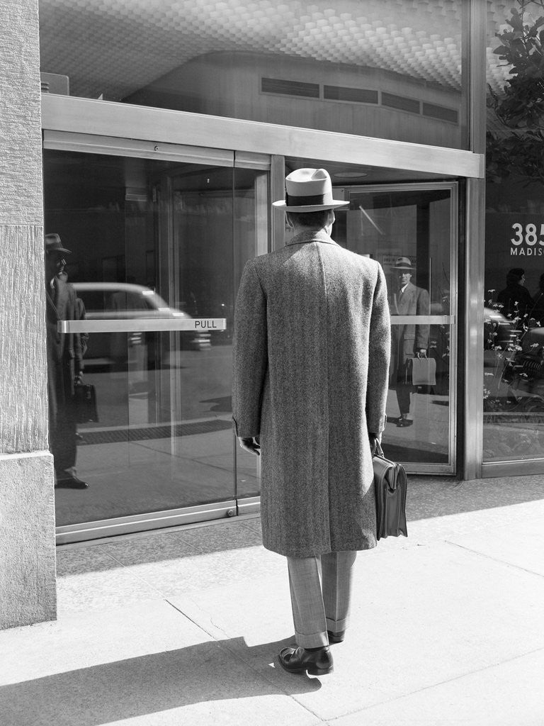 Detail of Salesman in Front of Office Building by Anonymous