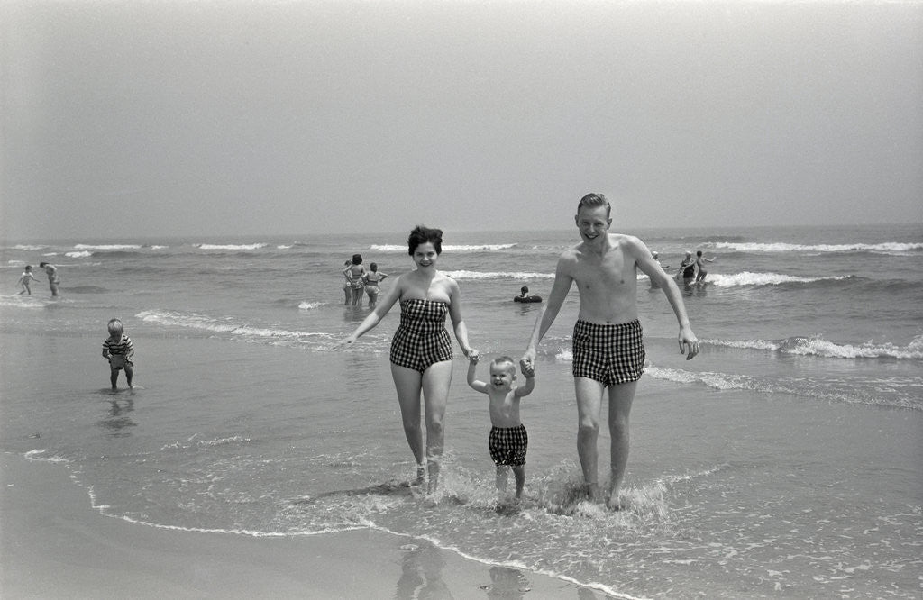 Detail of Family Walking on the Beach by Corbis