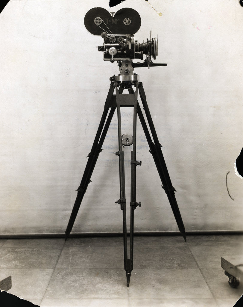 Detail of Early Movie Camera on Tripod by Corbis