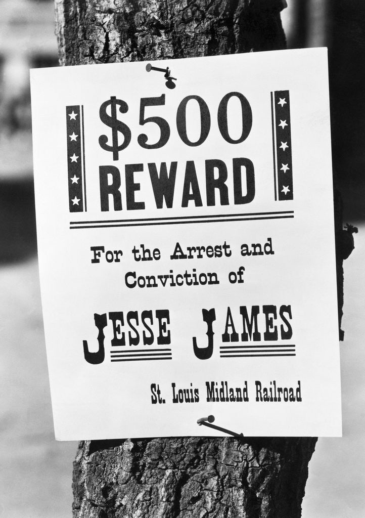 Detail of Jesse James Wanted Poster Nailed to Tree Trunk by Corbis