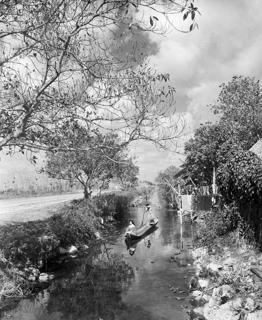 Detail of Seminoles Canoeing down Stream by Anonymous