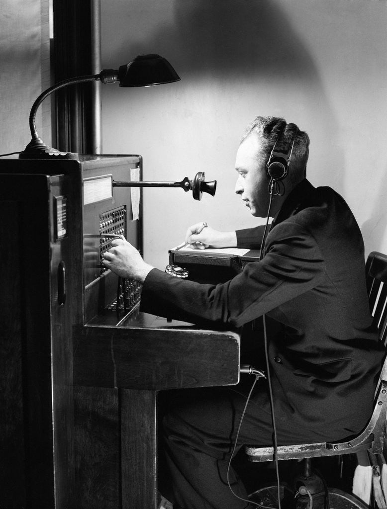 Detail of Man Connecting Call At Switchboard by Anonymous