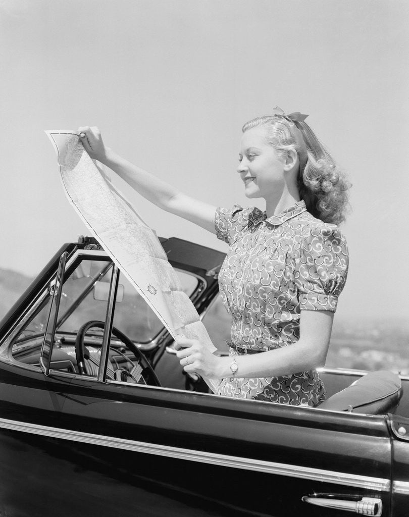 Detail of Young Woman Reading Road Map by Anonymous