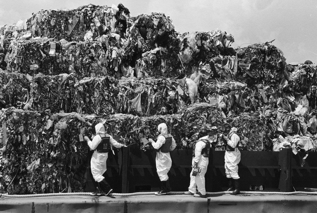 Detail of Workers Inspecting Garbage On Barge by Anonymous