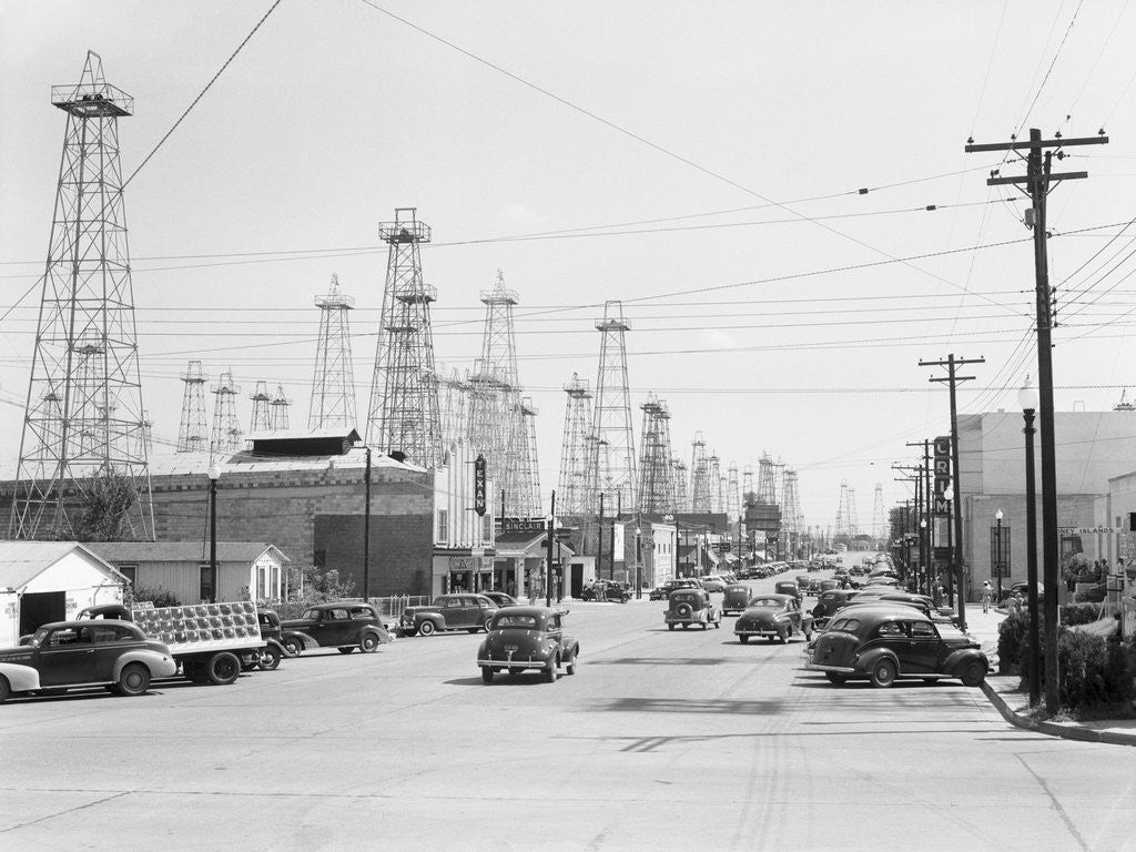 Detail of Clusters Of Oil Derricks Along Street by Anonymous