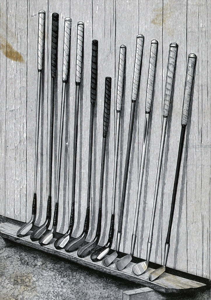 Detail of Variety Of Golf Clubs Lean Against Wall by Corbis