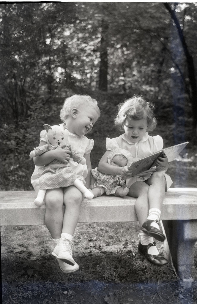 Detail of Two Little Girls Sitting On A Bench by Anonymous