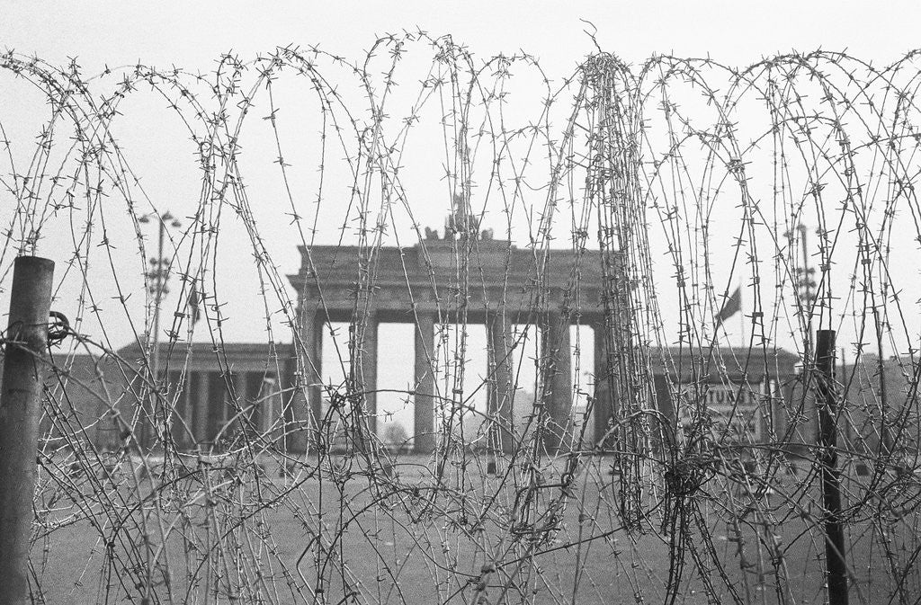 Detail of Barbed Wire and Brandenburg Gate by Corbis