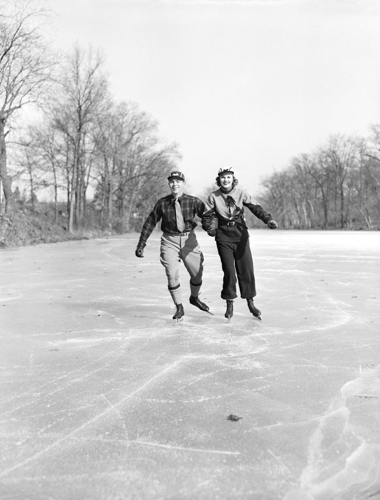 Detail of Couple Ice Skating by Corbis