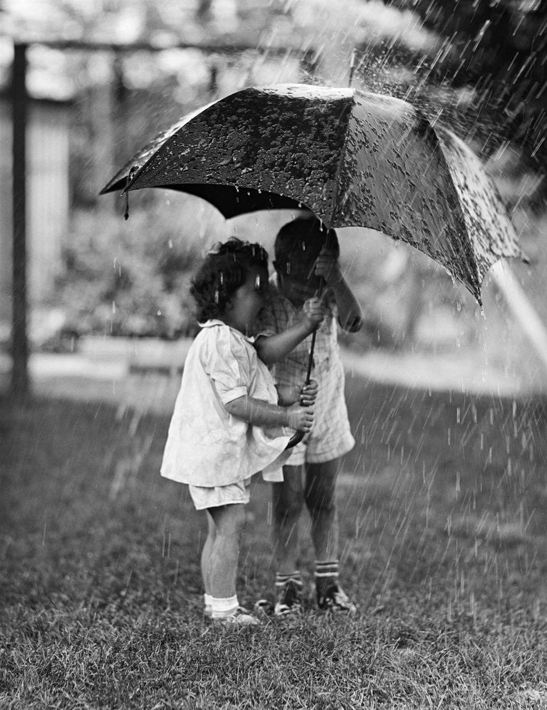 Detail of Two Children Under Umbrella During a Downpour by Anonymous