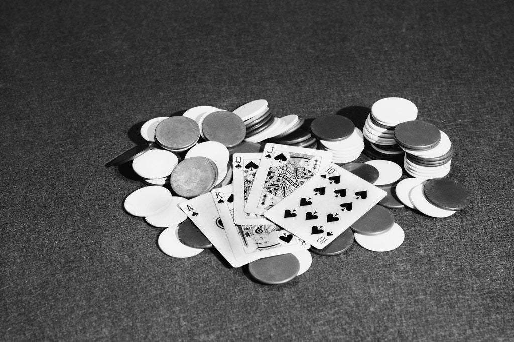 Detail of Spade Royal Flush on Poker Chips by Corbis