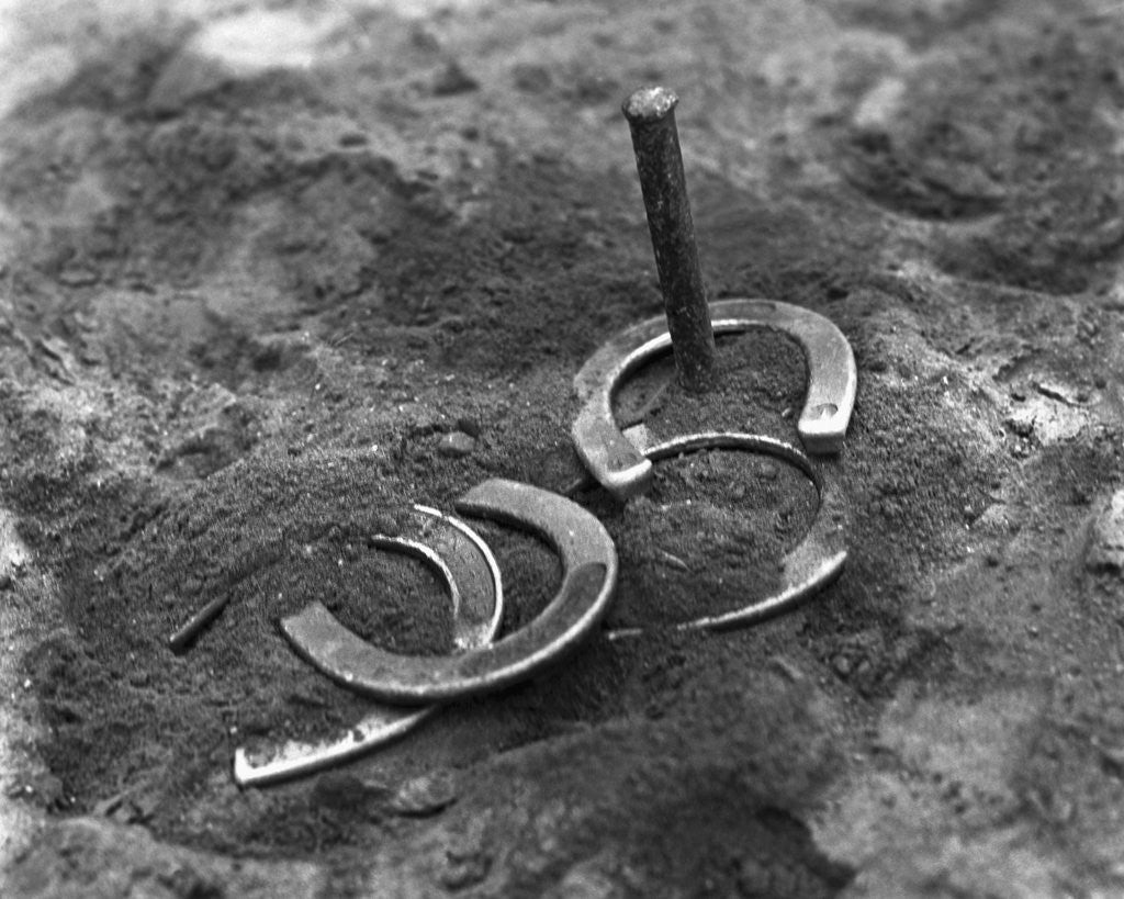 Detail of Horseshoes Around Pole by Anonymous