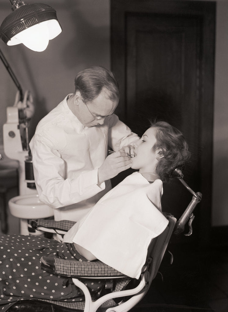 Detail of Dentist Examining Patients Teeth by Anonymous