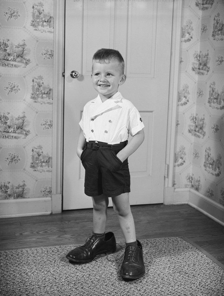 Detail of Boy Standing in Oversized Shoes by Anonymous