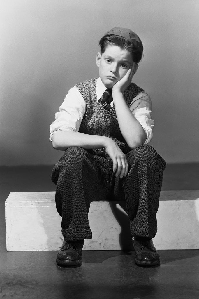 Detail of Boy in Dejected Pose by Corbis