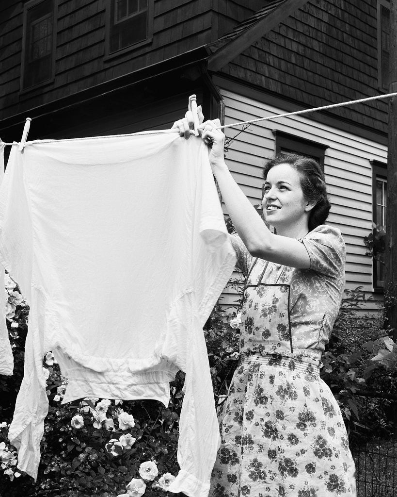 Detail of Woman Hanging Laundry Out to Dry by Anonymous